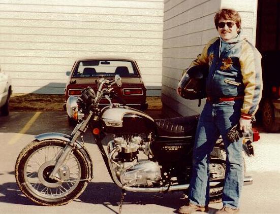 David standing by his motorcycle